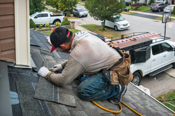 Professional Roofing technician working in Chester, NY